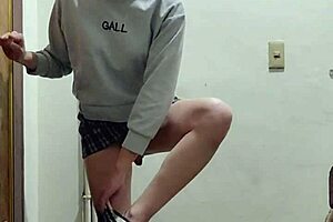 Chinese shemale ladyboy jerks off in public stairwell