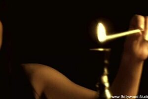 She dances gracefully, showing off her nude body.