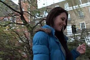 Beautiful slut caught pissing outdoors and fingering herself in busy London streets.