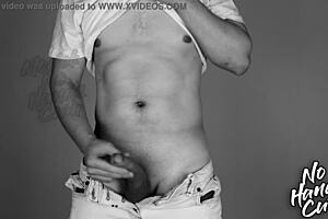 vintage retro sports guy jerks huge cock without hands