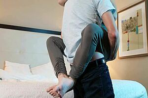 guy making out with hot woman in intimate setting