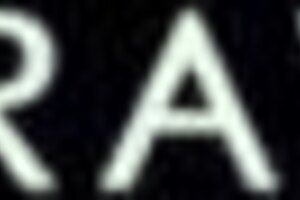 anna de ville and aaron rock share an interracial moment in stockings and lingerie, close up and sensual.