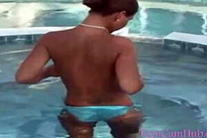 Teen Model Teases with Big Tits in Bikini by Pool