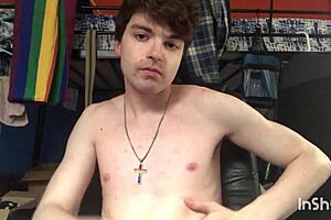 gay twink niko springs strips and teases with his big cock