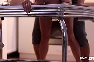 Couple enjoys quick homemade dinner preparation without explicit acts