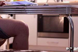 Couple enjoys quick homemade dinner preparation without explicit acts