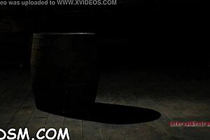 Brunette slave rides huge fake penis in BDSM