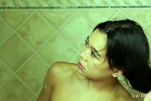 Super cute brunette teen slams a steamy hot shower solo