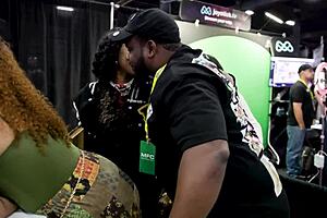 girls kissing in public parking lot at exxxotica nj 2024 vlog