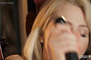 zoey monroe explores with a large toy in lingerie.