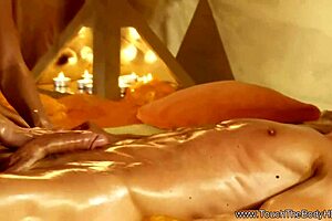 an asian lover gives a blonde woman an oiled sensual massage