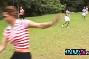 Soccer Trainer's Tight Asshole Gets Pounded Hard by Horny Trannies in Wild Gangbang!