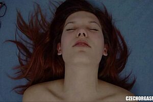 Watch this czech redhead fingering her big pussy lips to orgasm!