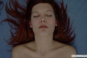 Watch this czech redhead fingering her big pussy lips to orgasm!