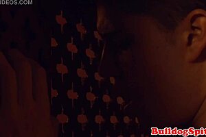 that punk priest is sucking cock and cumming in the confession booth, close up.