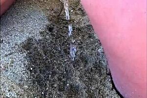 Dude, my wife peeing long on the beach!