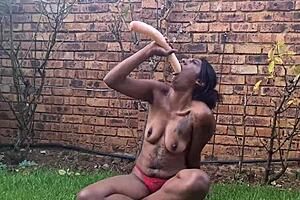 Indian amateur deepthroats dildo in garden, gagging and vomiting
