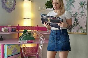 Blonde Cheerleader Teen Trying on Lingerie Gifts