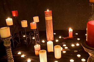 Amateur performs outdoor ritual with candles and masturbation