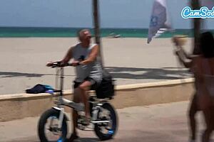 Big ass latinas ride electric trikes at public beach