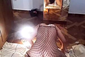 amateur woman in panties and lingerie performs striptease, undresses, rips clothes, masturbates with dildo, and rides in cowgirl reverse position