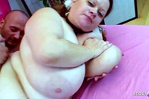 young woman with large natural breasts in intense activity