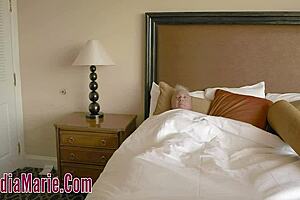 Claudia Marie with her large breasts and her partner with an abnormal cock and balls