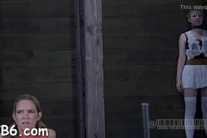 Caged hotty receives rough whipping on smooth pussy.