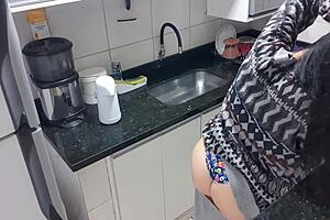 sensual lady in the kitchen masturbating