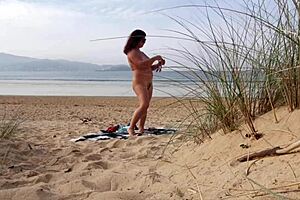 hey, ever seen a curvy milf change and workout on the beach?
