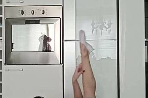 Petite brunette performs short gym routine in leggings showing small tits and narrow ass