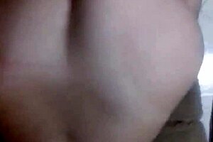 Amateur couple in crossdressing engages in passionate sex.