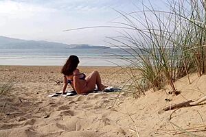 hey, ever seen a curvy milf change and workout on the beach?