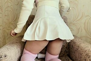 Amateur Girl Bent Over in White Skirt Uses Vibrator