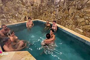 Latina MILF in see-through outfit enjoys motel party.