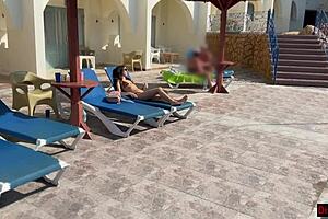 massage therapist treats cute girl on hotel vacation