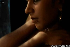 brunette indian woman dancing and undressing