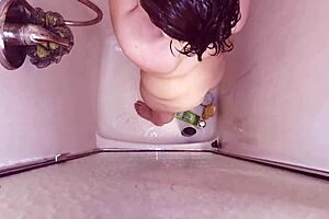 Why is the man sneaking to record bbw teen masturbating with dildo in shower?