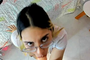 Hot latina woman shows off big tits on webcam.