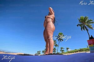 big clit latina shows off on beach in micro bikini