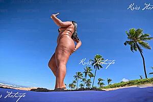 big clit latina shows off on beach in micro bikini