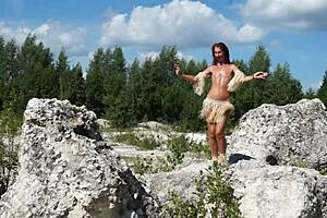 Mature topless dance in stone quarry