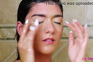 hey cutie, watch this brunette turn a shower into pure heat! 🔥