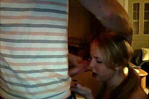 Girlfriend with pigtails sucks cock and receives facial