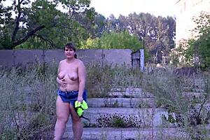 Curvy milf with big ass strips under short skirt in public outdoors