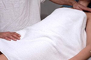 Pretty brunette client gets sensual massage from pervert masseur