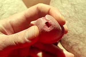 edging from flaccid, playing with precum in natural light