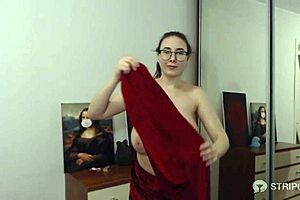 brunette camgirl oils her huge tits with glasses