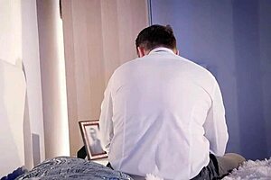 husband prepares wife's ass for anal at swingers party