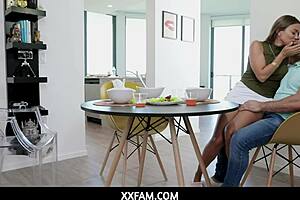 Busty cougar interacts with stepson in family setting